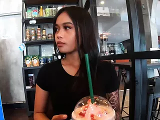 Starbucks coffee election in the air Asian teenager